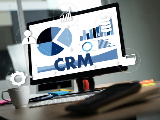 Team analyzing long-term CRM expenses, scalability, and maintenance costs beyond the initial custom CRM investment