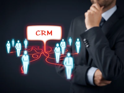 Development team building Exovations, a custom sales flow CRM platform, with project planning and software dashboards displayed during a 90-day implementation